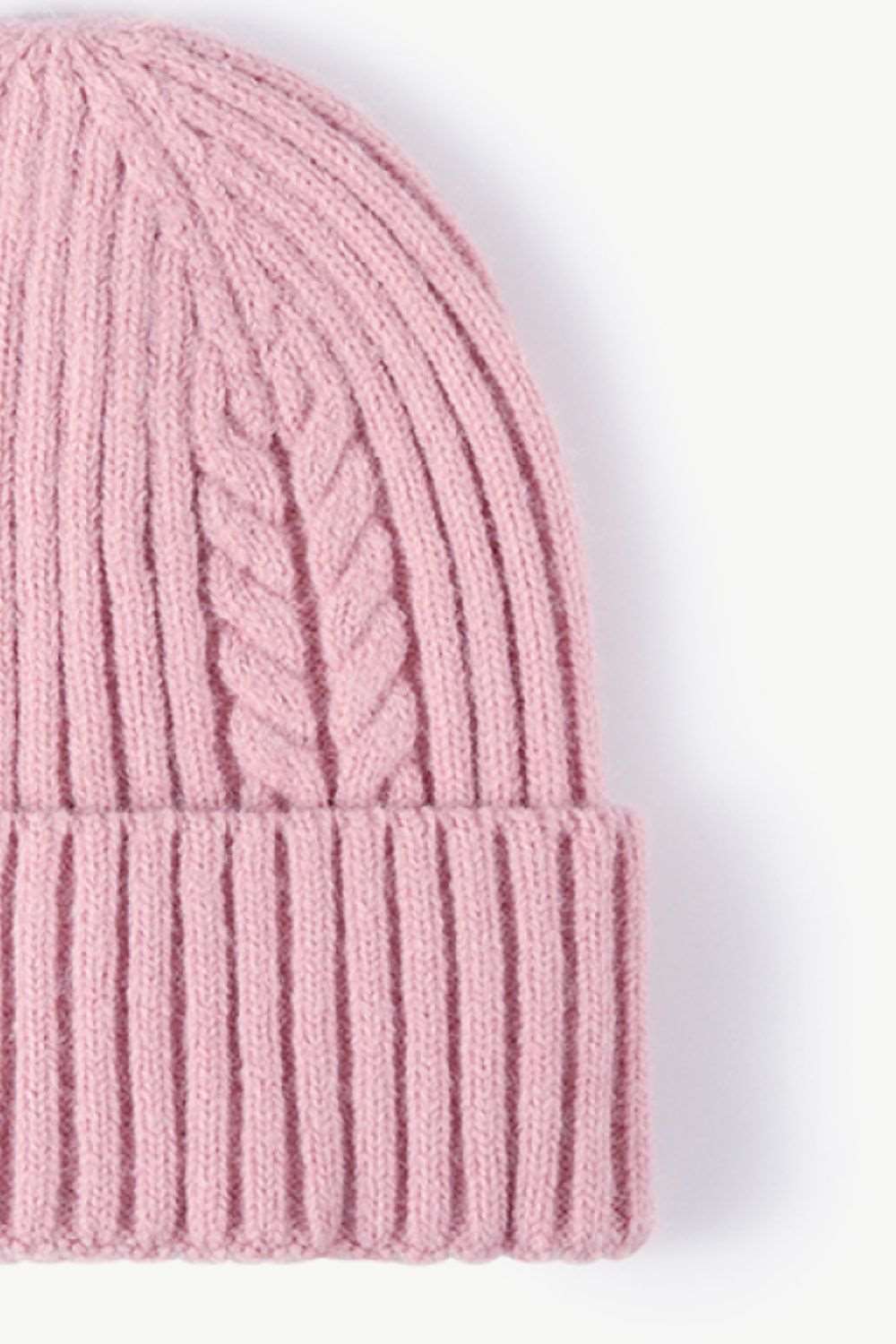 Side view of pink Cable-Knit Cuff Beanie, showcasing the soft textured knit and fold-over cuff for a cozy, stylish winter look