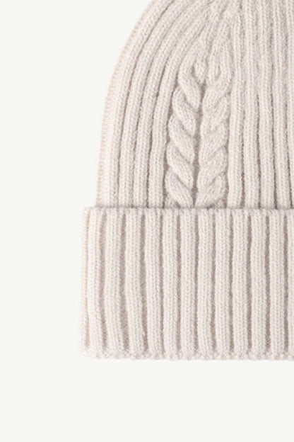 Left side view of white Cable-Knit Cuff Beanie, highlighting the soft textured knit and fold-over cuff for a cozy and stylish winter accessory.